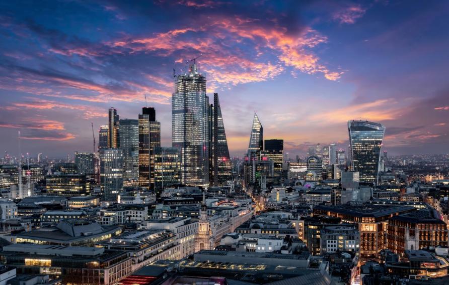 London skyline at dusk with purple sky